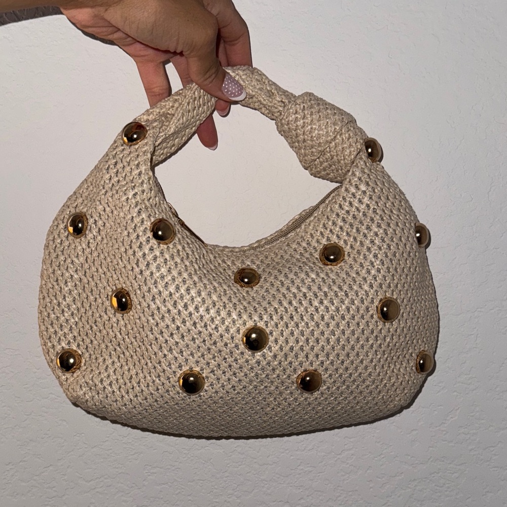 Stylish Tan Woven Bag with Gold Accents